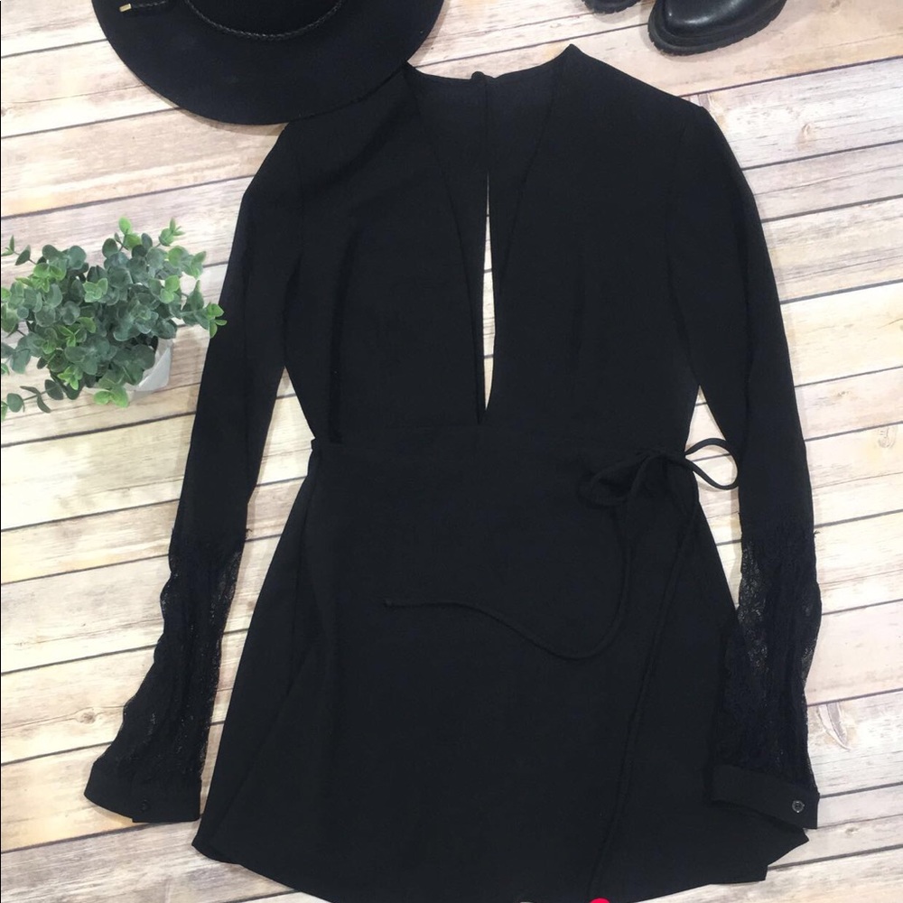 Black Deep V Romper by Nasty Gal